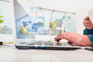 Man works with laptop with internet streaming service