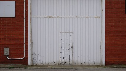 Obraz na płótnie Canvas damaged iron industrial door background