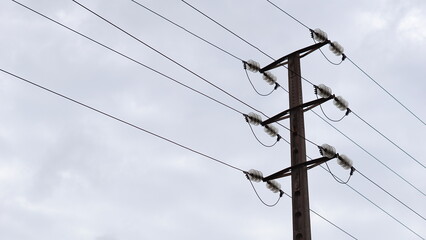 electric pole against sky background