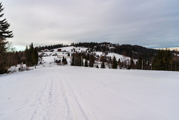 Fototapeta na wymiar Cieslar hill from Maly Stozek in winter Slezske Beskydy mountains on czech - polish borders