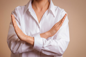 Crossed hands. Break the bias symbol of woman's international day. Woman arms crossed to show...