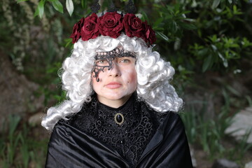 Pompous victorian lady wearing roses crown and a mask