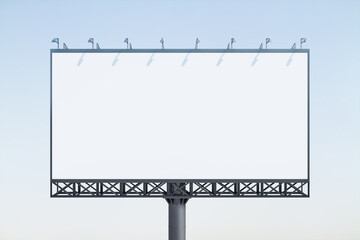 Obraz premium Blank white horizontal billboard on blue sky background at daytime, front view. Mock up, advertising concept