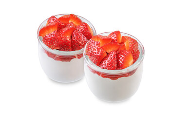 Greek yogurt with strawberries in a glass on a white isolated background