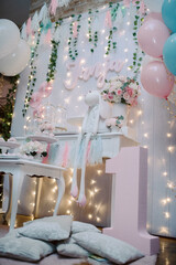 Interior decoration for a child's birthday is one year. Sweet table with cake 