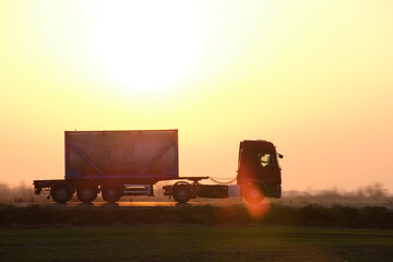 Petrol cargo truck driving on highway hauling oil products. Delivery transportation and logistics...