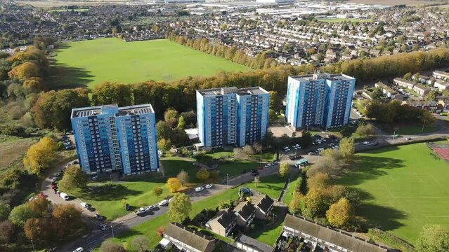 Dron shot UK england open shot sun afternoon sky buildings London smog mist dark church paning left covid trees tree front green bus back cars rush hour vol.3.mp4