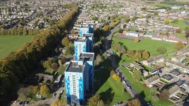 Dron shot UK england open shot sun afternoon sky buildings London smog mist dark church paning left covid trees tree front green bus cars rush our vol.2.mp4