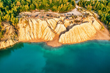 Quarry and golden beach with beautiful blue, turquoise water. Aerial photography from a drone. Ukraine. concept, vacation, travel, nature and landscape