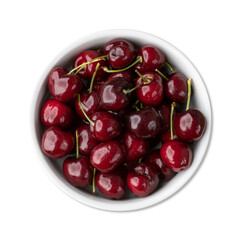 Red cherries on a bowl isolated over white background