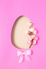 Paper cut Easter egg with cherry blossom branch. copy space