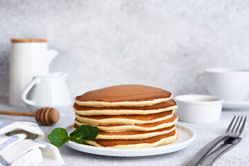 pancakes stack on table with butter.  Maslenitsa holiday concept