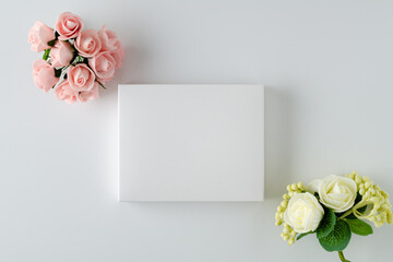 White box with small roses