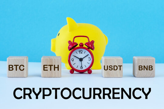 symbols and names of cryptocurrencies, piggy bank, alarm clock.