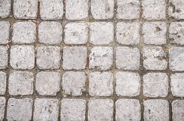 Old paving stones texture.. Stone wall texture.