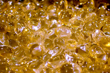 Golden Quartz stone crystals on polished slab Full frame of colorful gemstones texture. Natural...