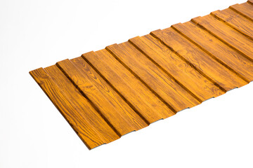 Roofing metal tiles and sheet facade and roofing corrugated board. Facing material with the texture of wood, brickwork, natural stone. 