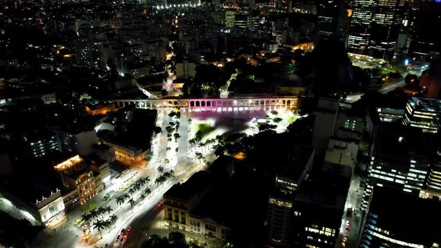 Night scape of Rio de Janeiro Brazil. Panoramic view of illuminated downtown district of Rio de Janeiro Brazil. Buildings and avenue landmark of city. Famos Rio de Janeiro capital city.