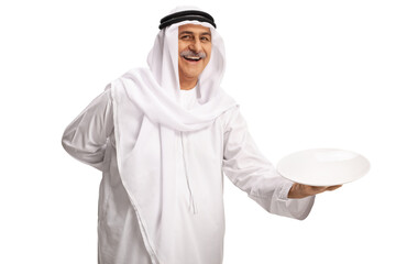 Mature arab man holding an empty plate and smiling