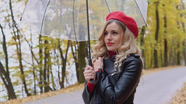 Beautiful Young Woman Coughs Standing By An Umbrella On A Cold Autumn Day. Seasonal Illnesses, Cough, Cold