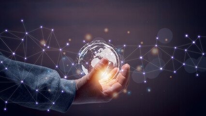Man hand holding the virtual world. Internet connection concept with metaverse, global business and...
