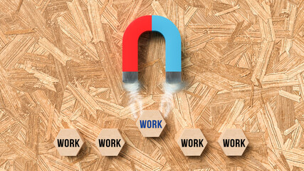 magnet attracting the hexagon with the word work on wooden background