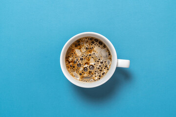 simple classic hot cup of tea view from above, colorful background with copy space