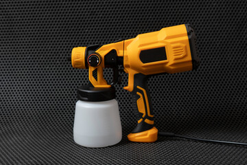 black and yellow sprayer gun tool isolated