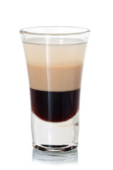 shot with layered cocktail on glass table