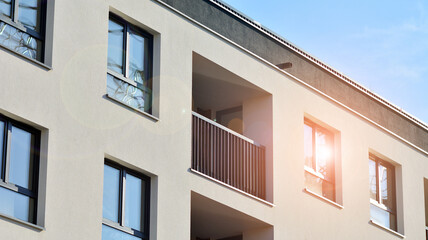 Abstract architecture, fragment of modern urban geometry,. Modern apartment building on a sunny day with a blue sky,. European residential apartment buildings.