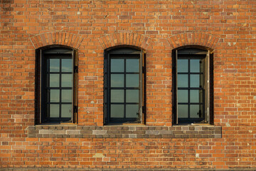 Fototapeta na wymiar レンガの扉　Photo of old brick warehouse door 