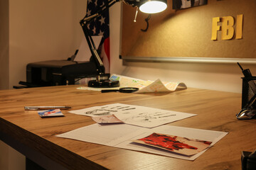 Workplace of FBI agent in office at night
