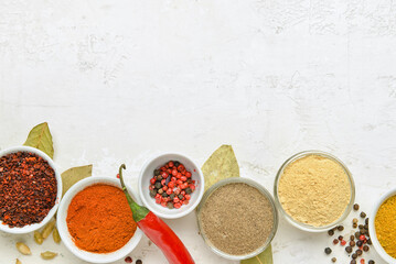 Obraz na płótnie Canvas Set of different aromatic spices on light background