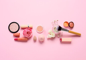 Naklejka premium Composition with flowers and cosmetic products for International Women's Day celebration on pink background