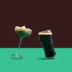 Modern concept of dancing glasses. A unique Irish coffee glass and pint of black stout craft beer...