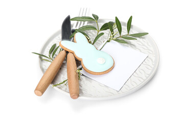 Stylish table setting with Easter cookie on white background