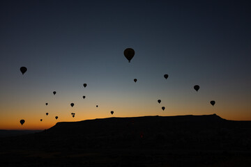 Cappadocia at sunrise. Hot air balloons in Cappadocia. Travel to Turkey