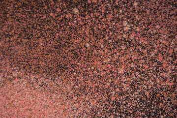 background in the form of scattered powder, small particles of powder