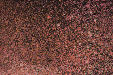 background in the form of scattered powder, small particles of powder