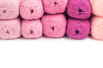 Close Up of yarn balls. Rainbow colors. Yarn for knitting. Skeins of yarn. Knitting needles, colorful threads. Knitting background, Knitting yarn for handmade winter clothes. top view table concept.