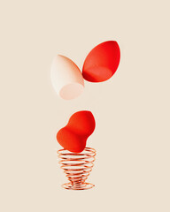 Cosmetic sponge red colored in stand on beige neutral background. Red make up sponge beauty blender, brush for face skin, facial applicator. Salon fashion beauty makeup concept.