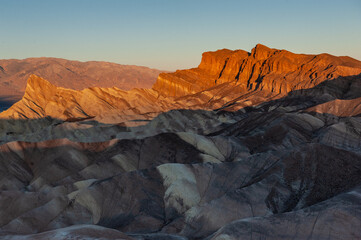 Zabriski point is one of the most colourful spots in Death Valley national park, in particular during sunrise, as depicted in this image.