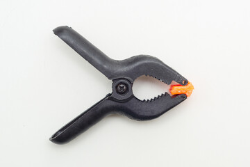 clip clothespin for photophone on white background, photo accessories