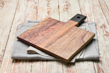 Cutting board on wooden  background