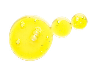 Drops of cosmetic serum on white background
