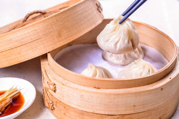 The Pork Buns Steamed In Bamboo Steamers	