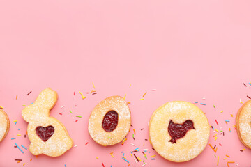 Delicious Easter cookies on pink background