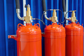 Gas fire extinguishing system. Gas extinguishing equipment. Red cylinders with pneumatic start....