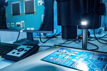 Production and testing of microcircuits. Microcircuit under electron microscope. Checking chip for damage. PCB board in monitor. PCB testing after production. Modern methods of testing microcircuits