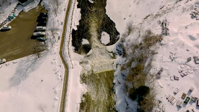 Birds eye view Aerial Slow Motion 120fps  Snow waterfall River